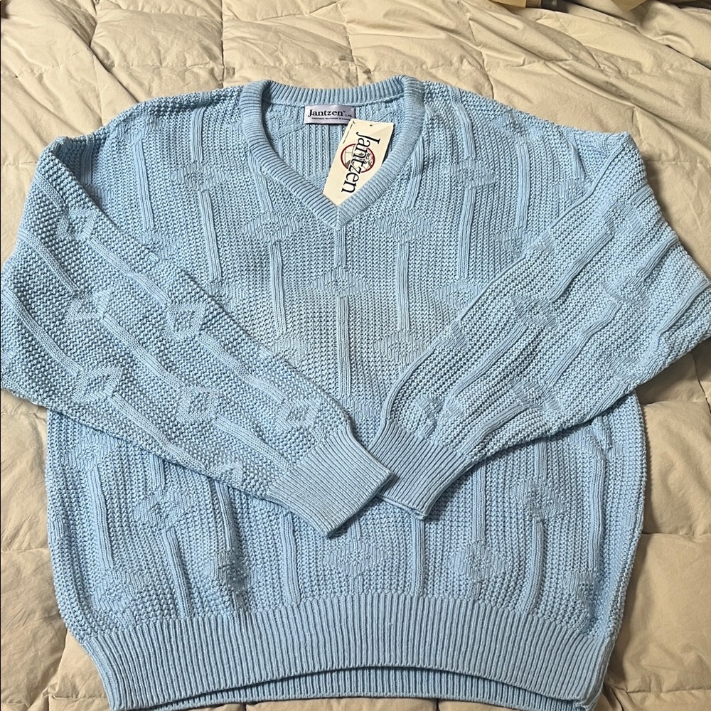 Men’s brand new but vintage 100% cotton blue sweater
Size L NWT